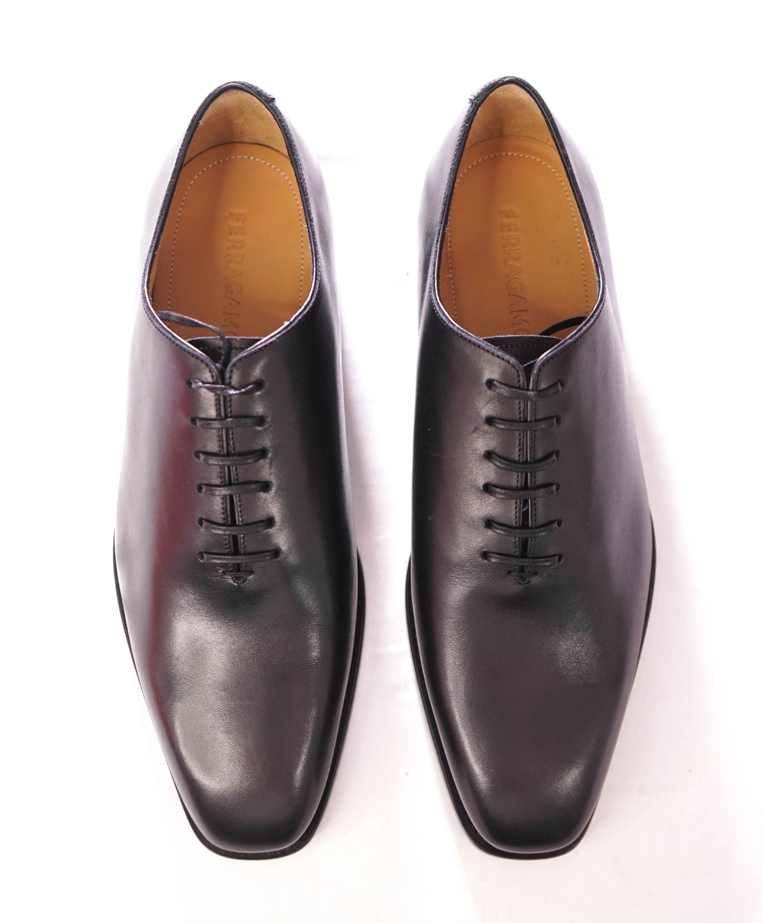 $1,095 FERRAGAMO - "GOFFREY" Black Whole Cut Oxfords - 8 EEE