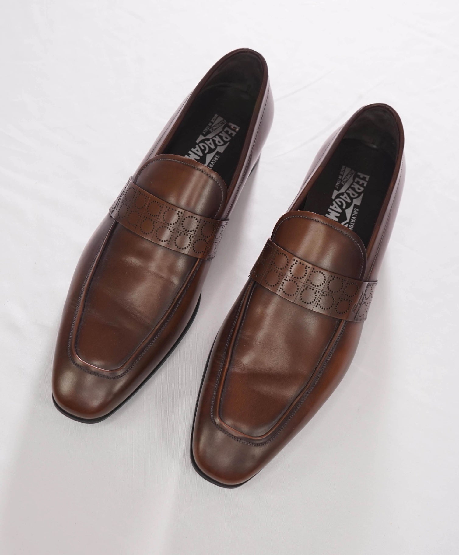 $850 FERRAGAMO - Brown Leather “GOLIATH" Gancini Embossed Loafers - 10.5 D