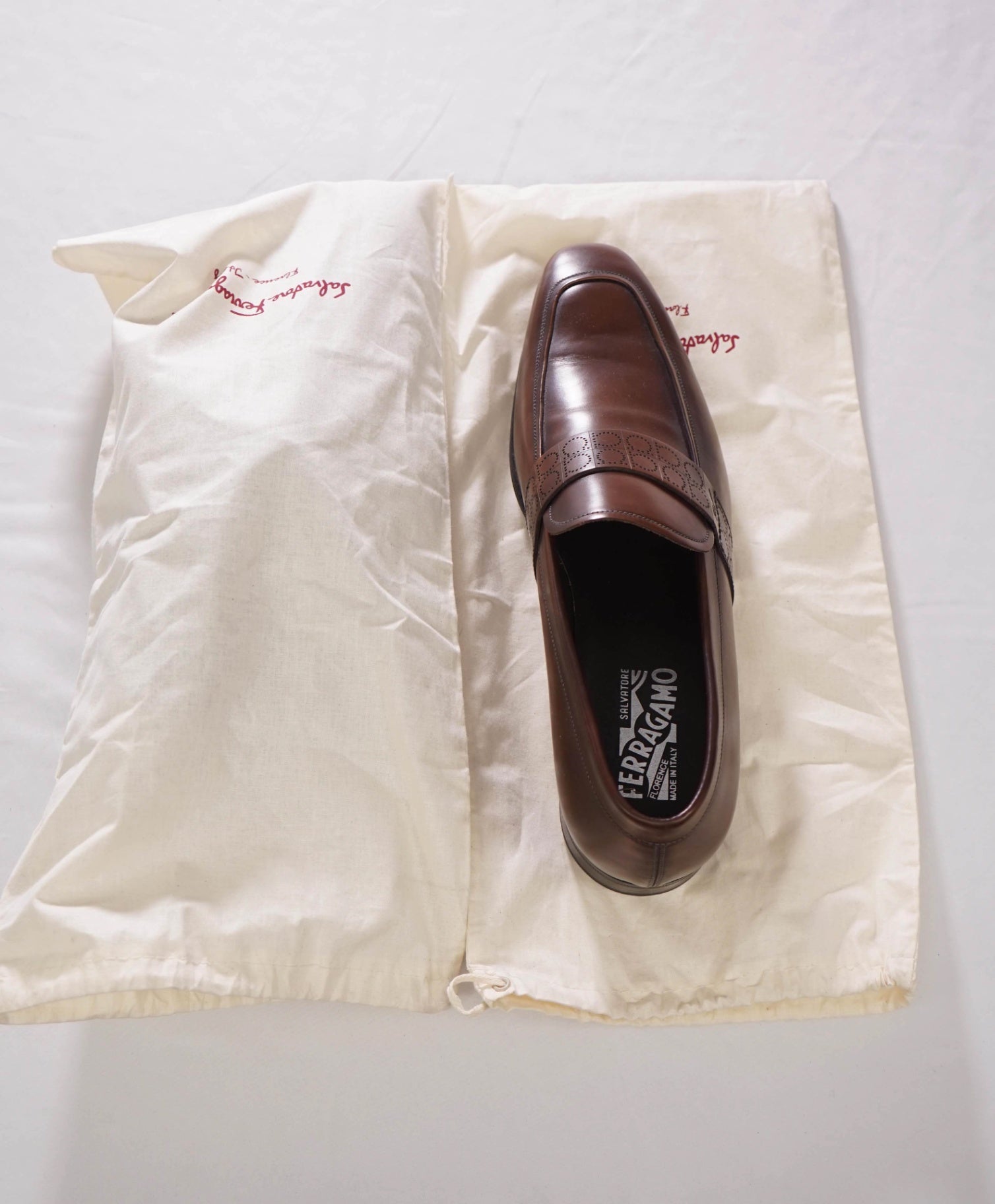 $850 FERRAGAMO - Brown Leather “GOLIATH" Gancini Embossed Loafers - 10.5 D