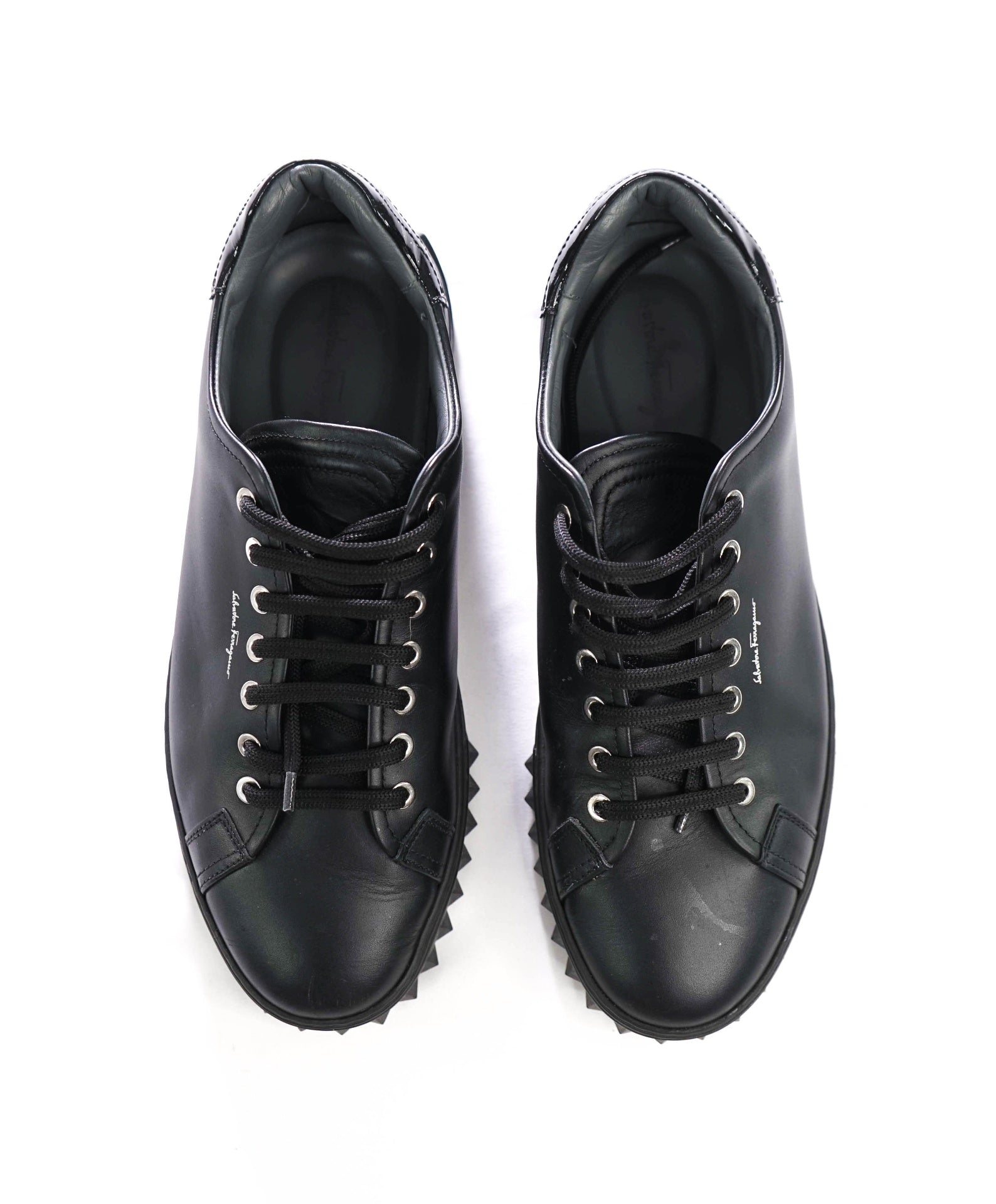 $750 FERRAGAMO - Black Leather Sneakers - 9.5 M