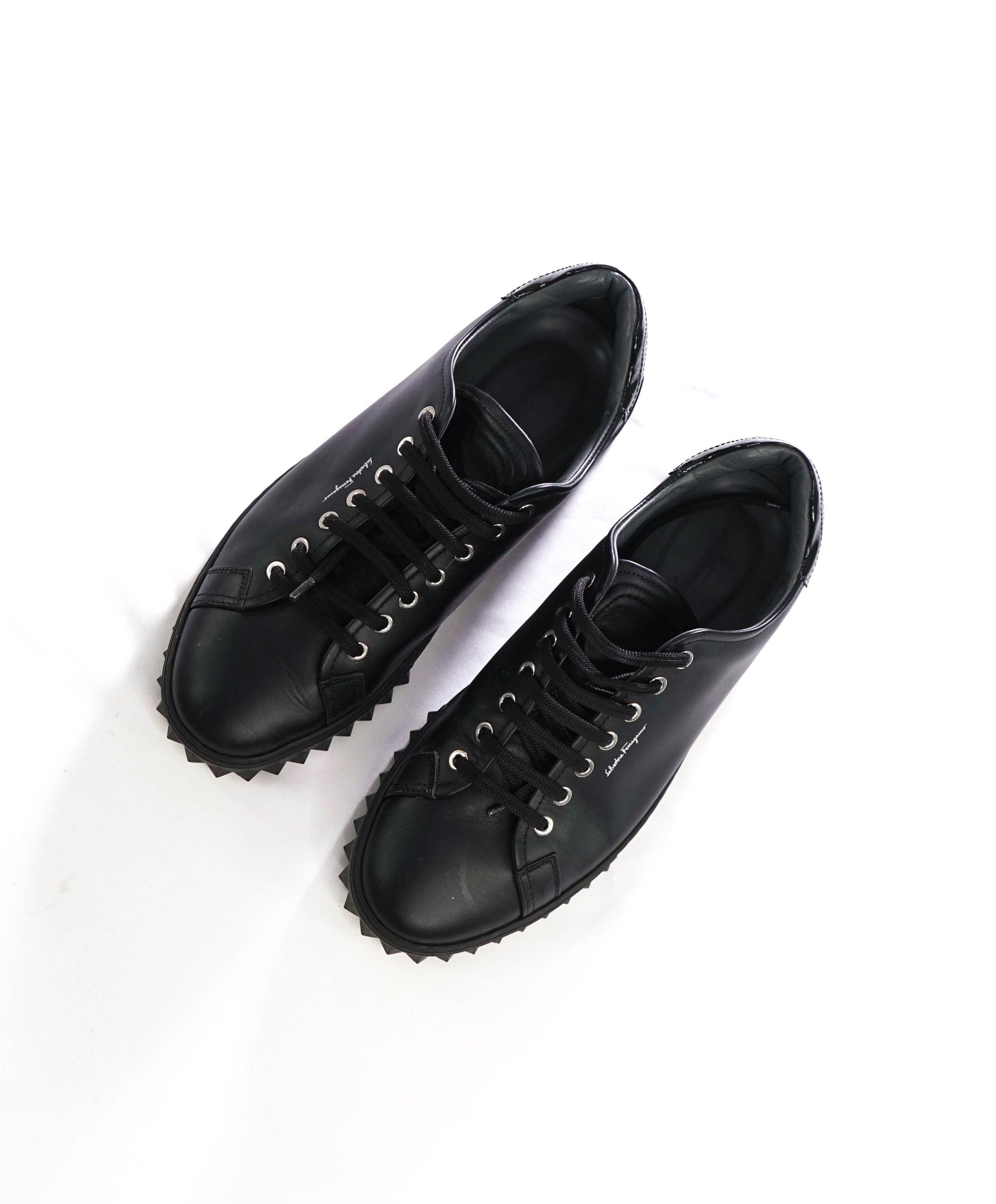 $750 FERRAGAMO - Black Leather Sneakers - 9.5 M