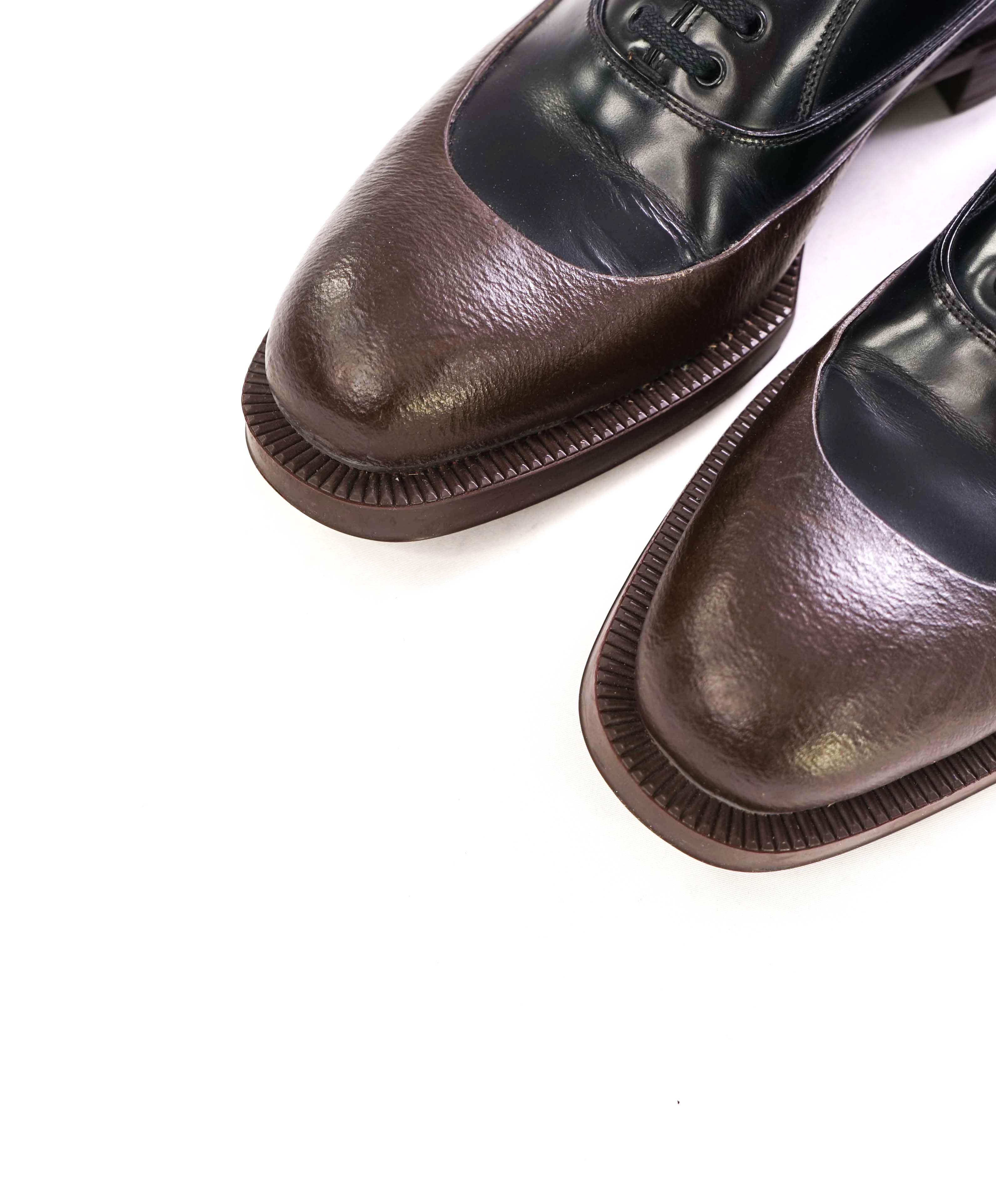 $1,320 PRADA - Black/Brown Leather Mixed-Media Lug Sole Oxfords - 8 US (7 Prada)