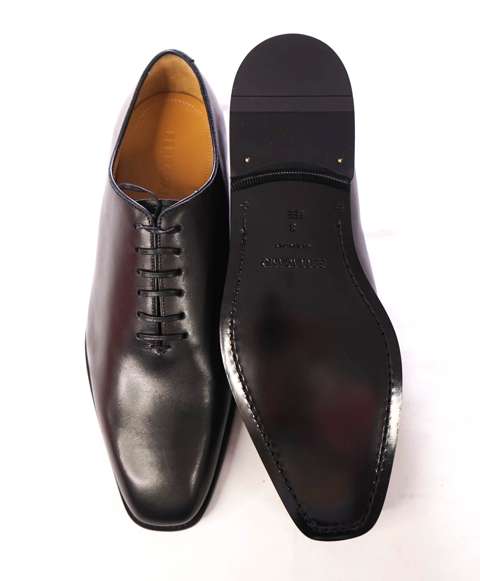 $1,095 FERRAGAMO - "GOFFREY" Black Whole Cut Oxfords - 8 EEE