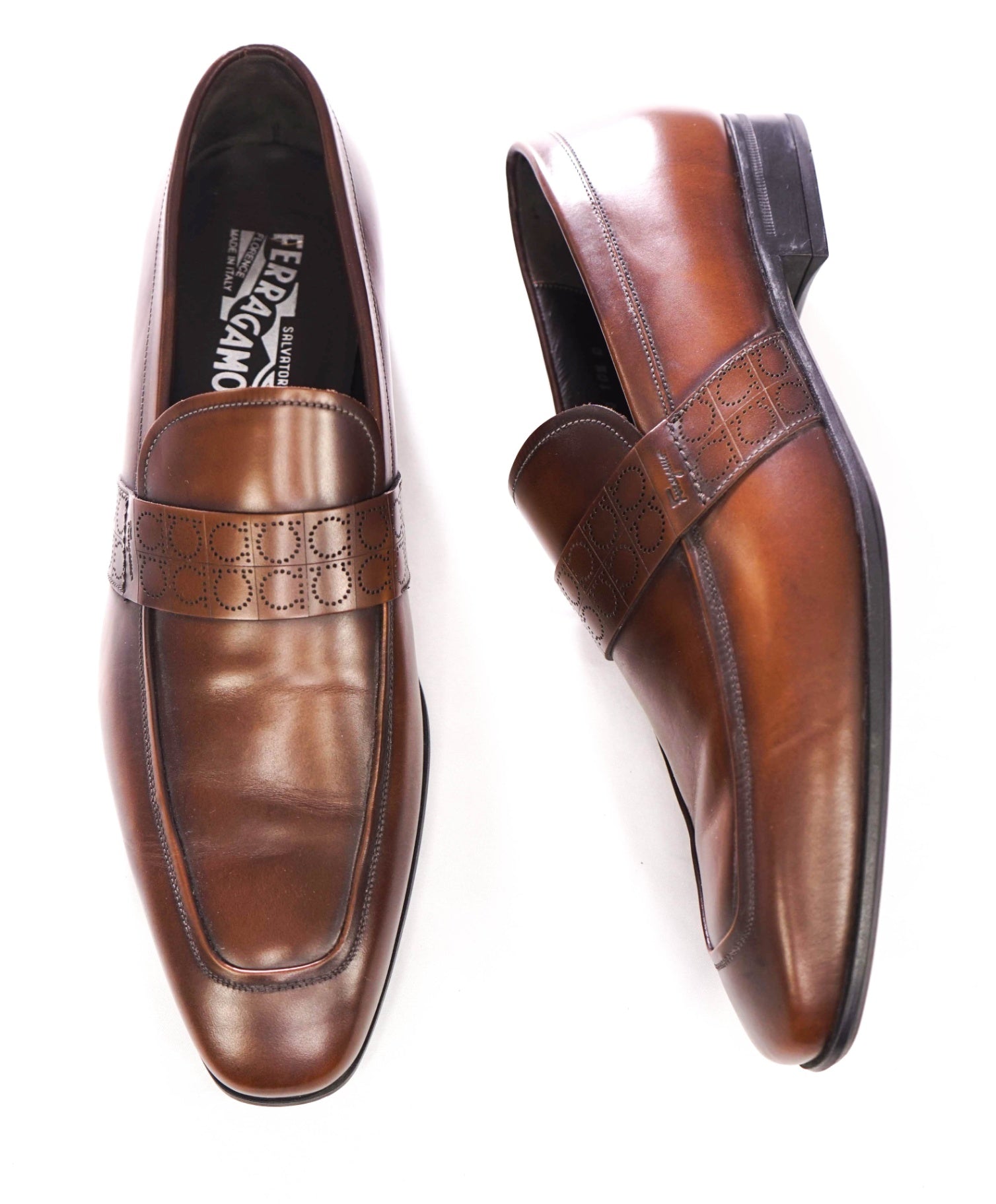 $850 FERRAGAMO - Brown Leather “GOLIATH" Gancini Embossed Loafers - 10.5 D
