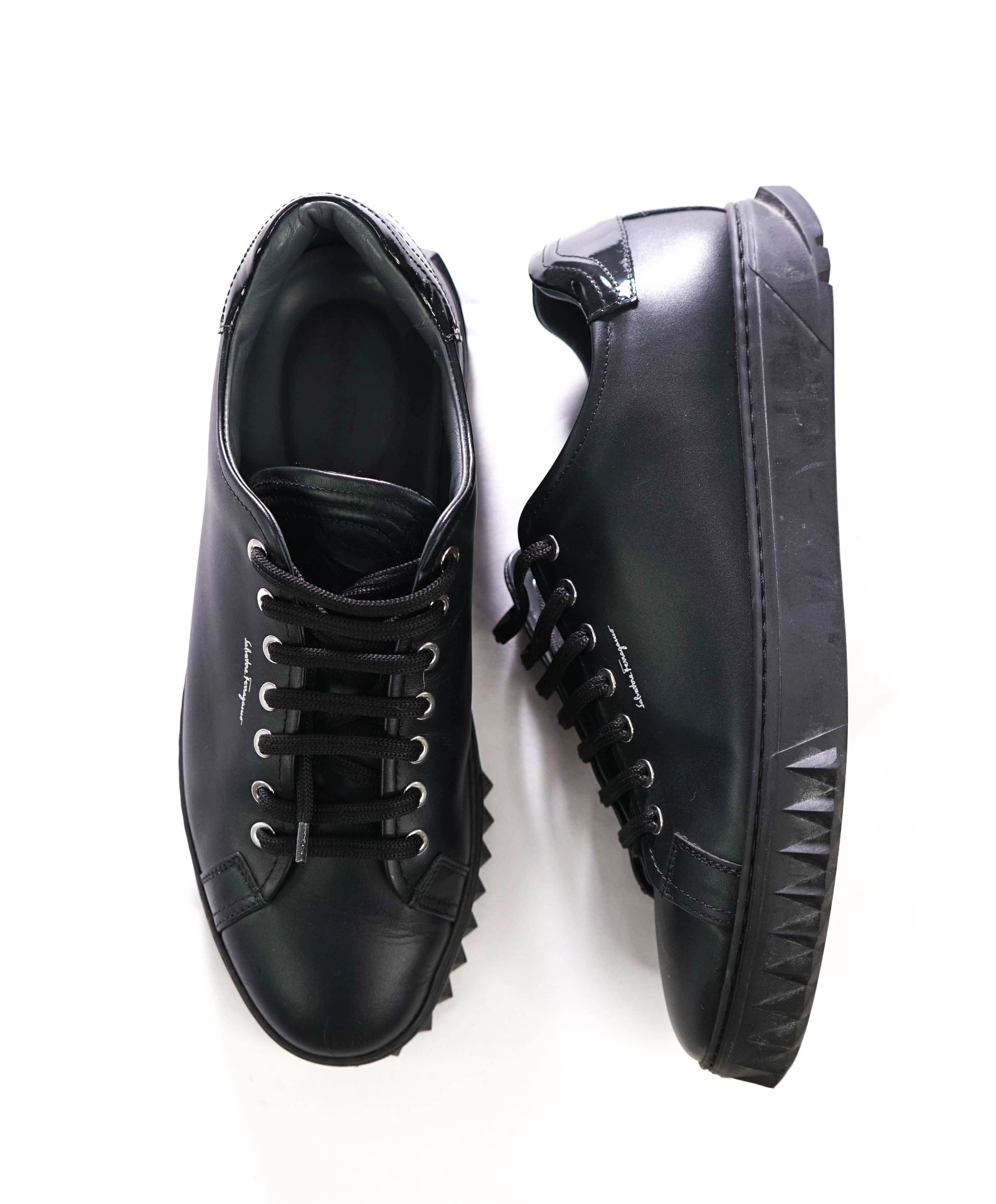 $750 FERRAGAMO - Black Leather Sneakers - 9.5 M