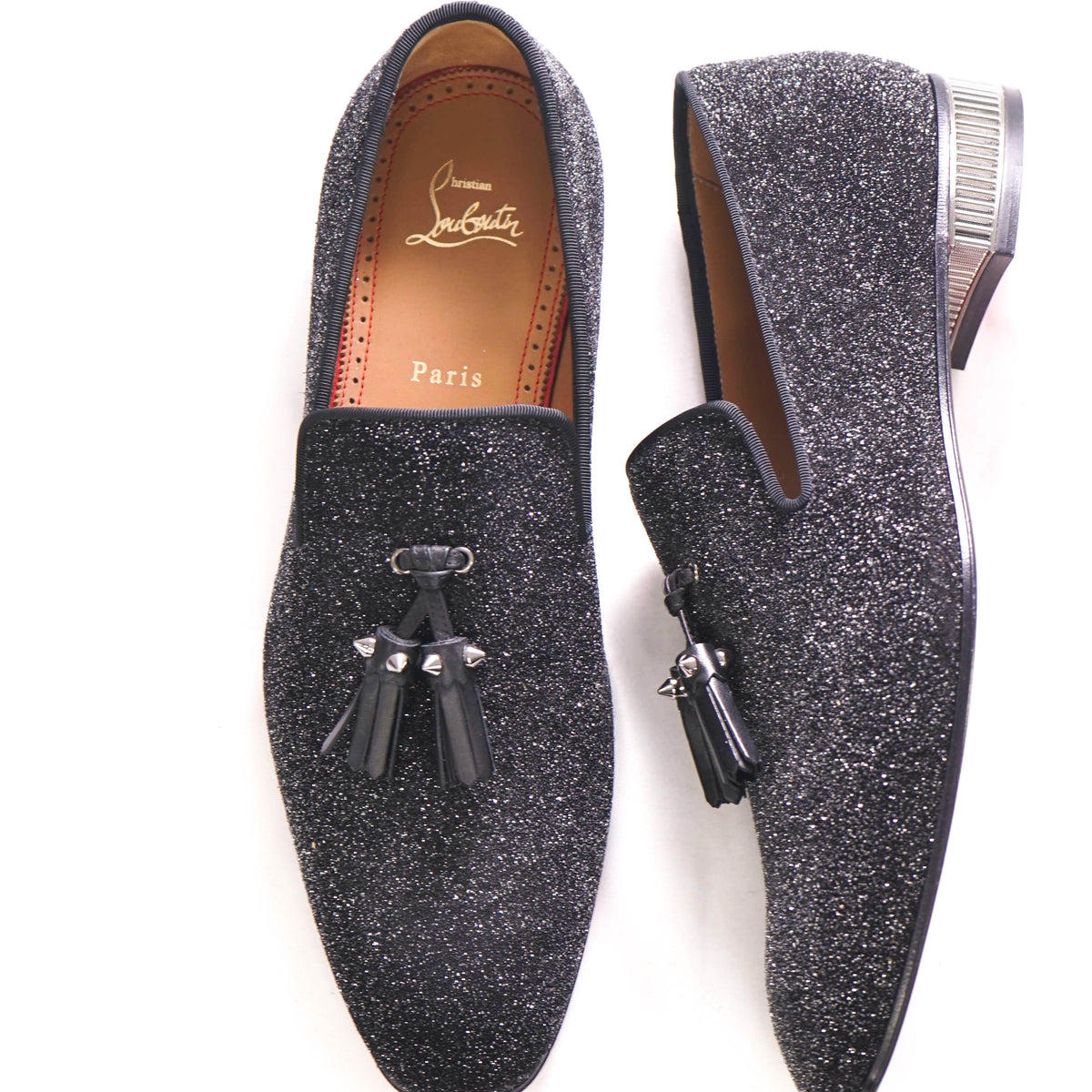 CHRISTIAN LOUBOUTIN
Colonnaki glittered leather loafers, Used , size 39.5 $1,250 CHRISTIAN LOUBOUTIN - * Colonnaki* Glitter Spiked  main image 3