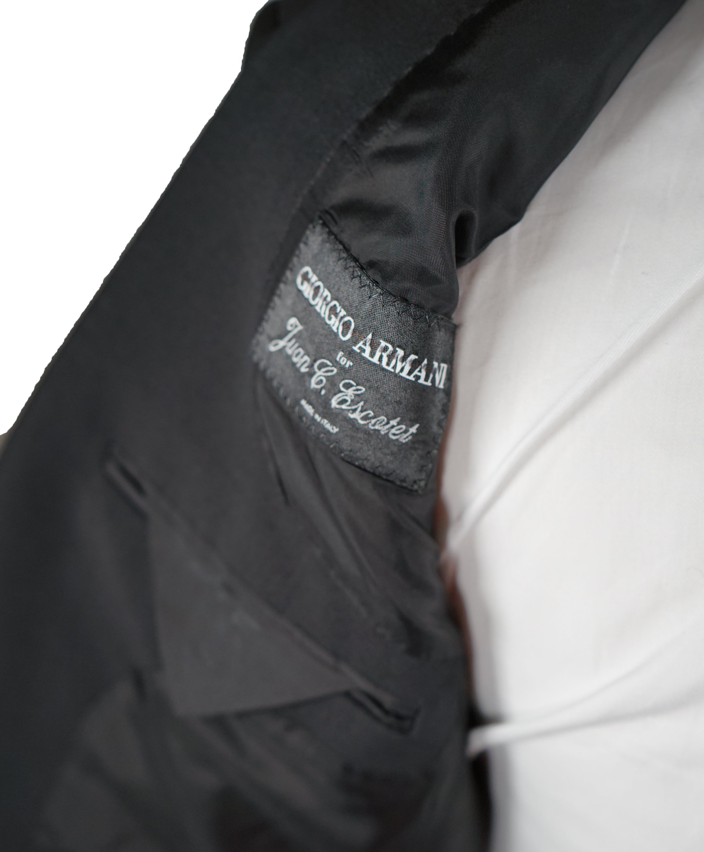 Armani black deals label suit